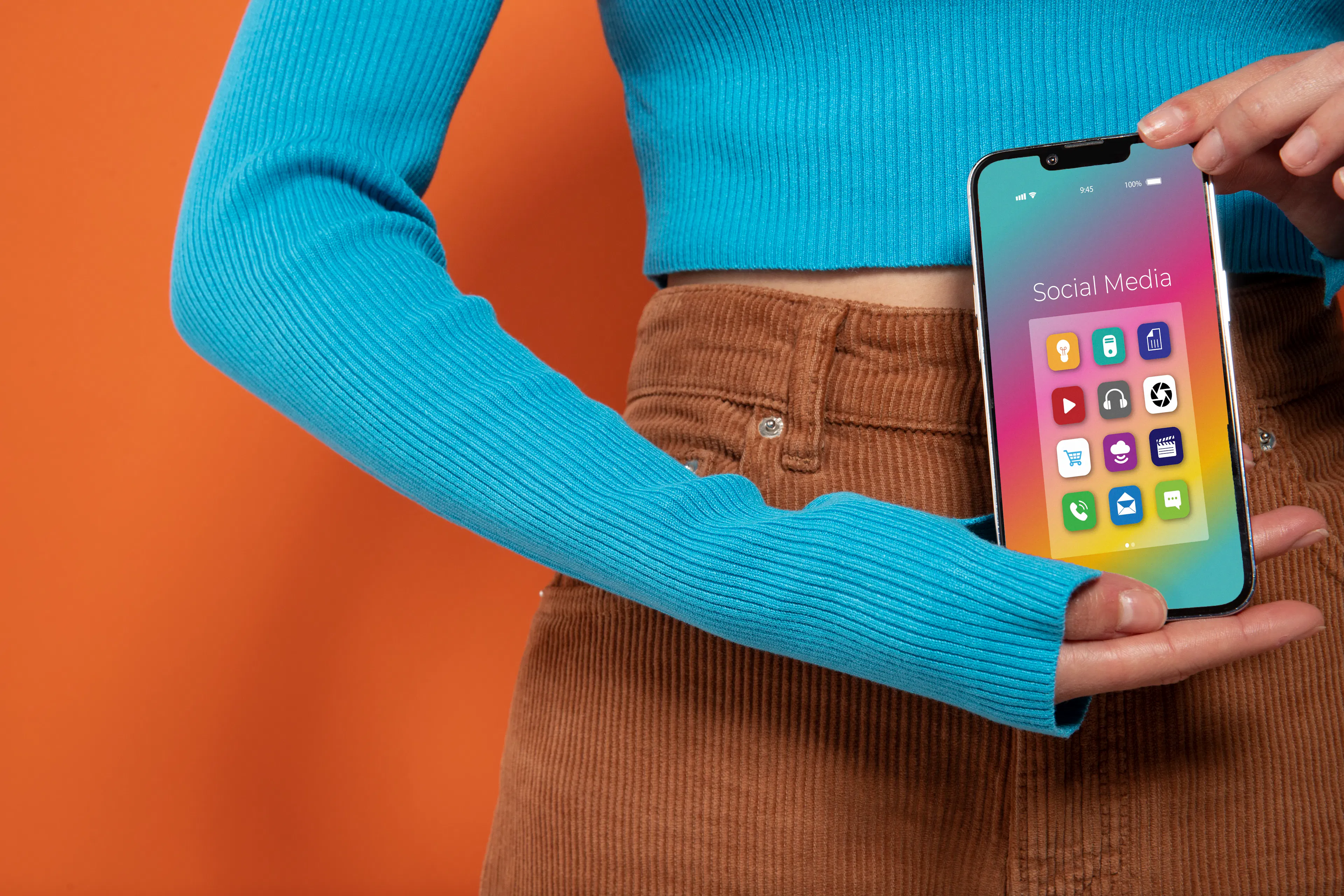 woman showing smartphone app to illustrate app technology