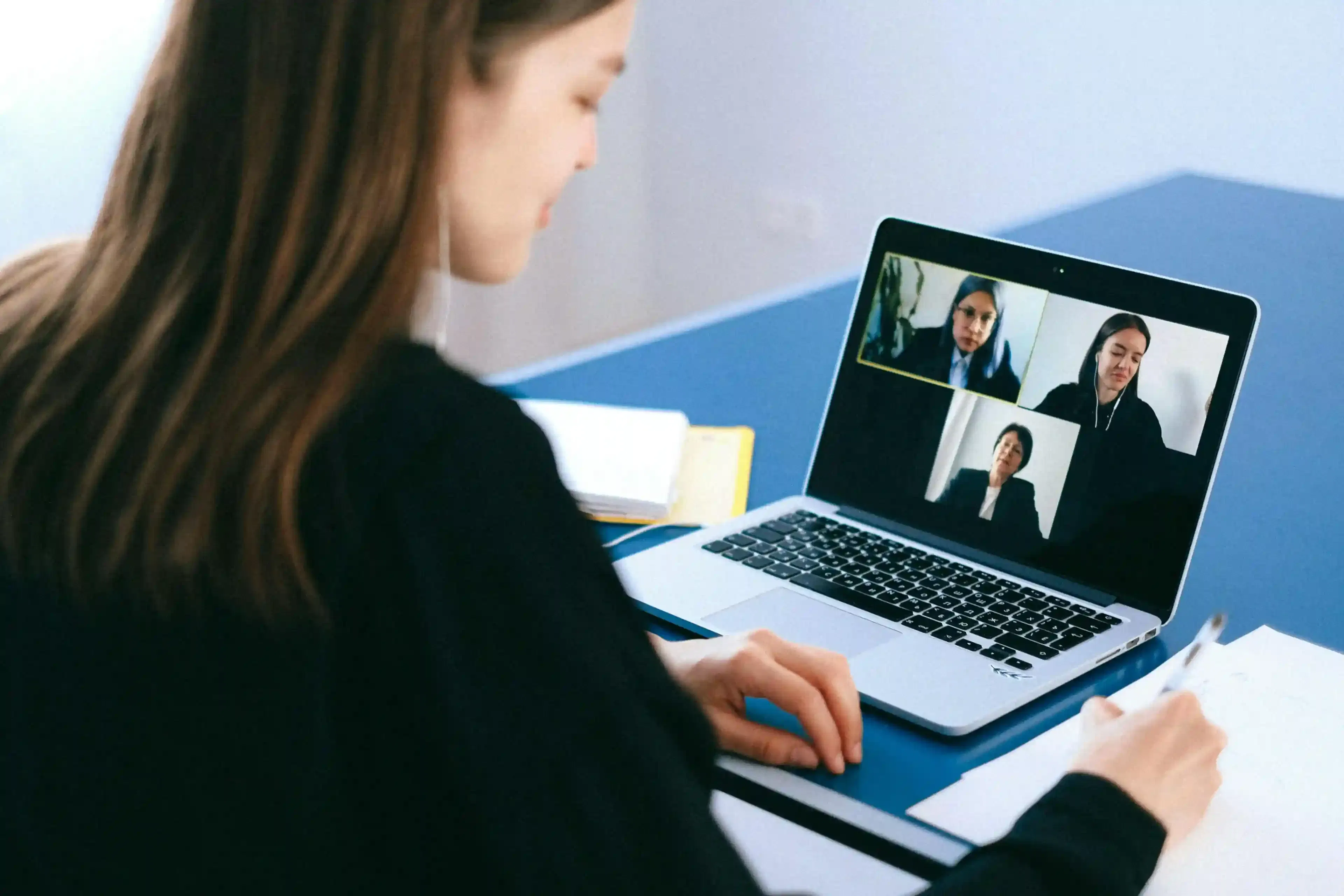 React developer studying interview questions on screen