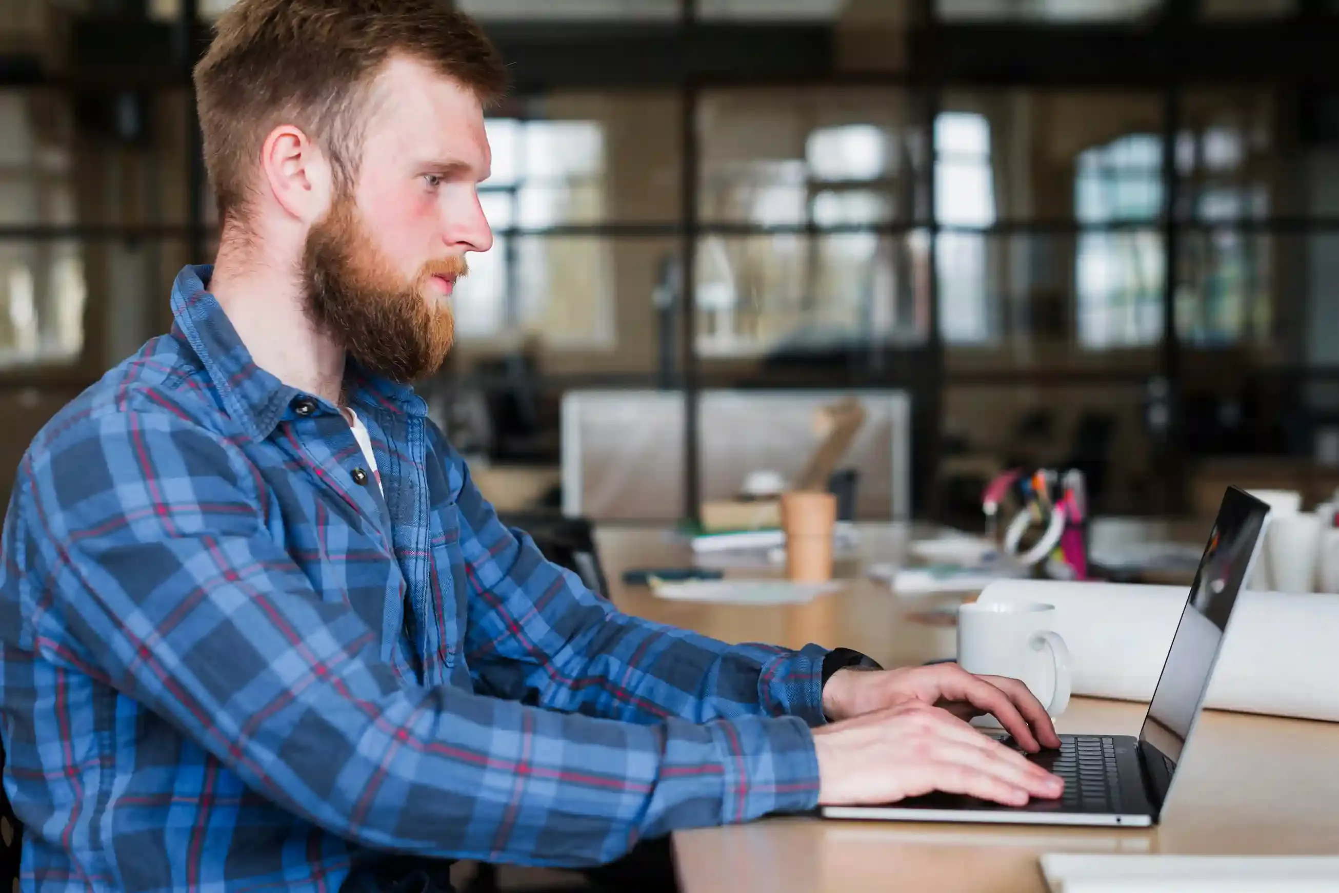 developer working on laptop for software technology
