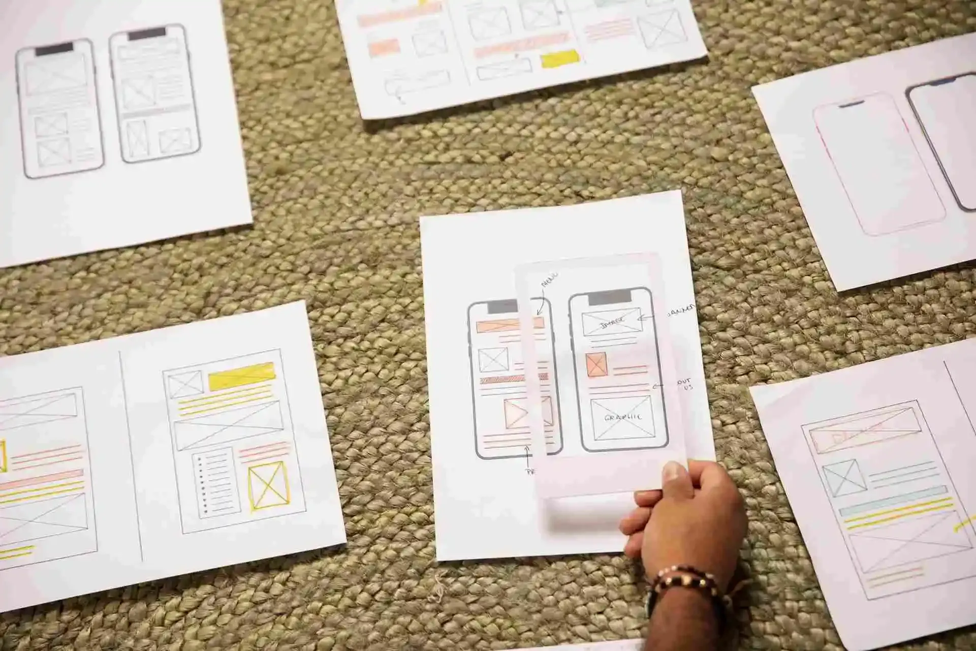 mobile app development professional working on software project in modern office