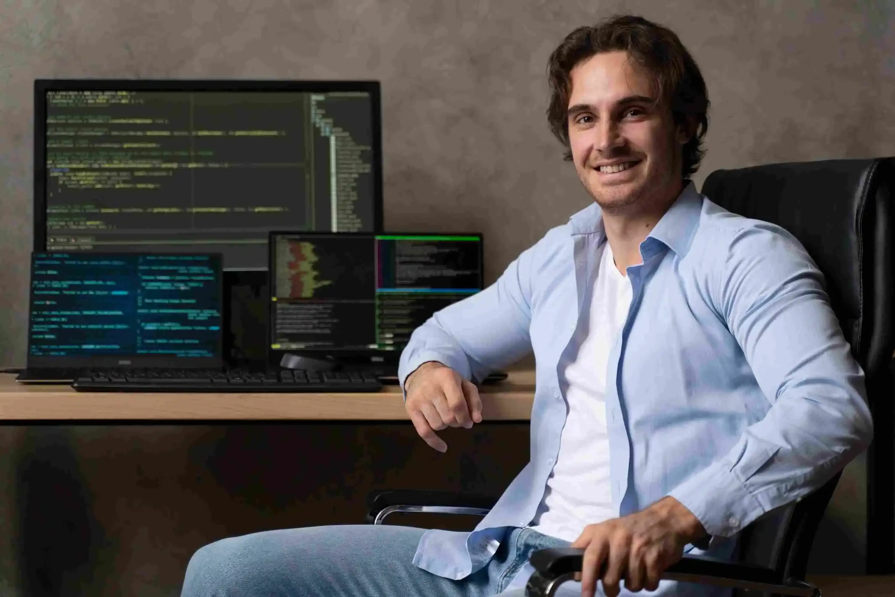 programmer sitting in chair working on software development