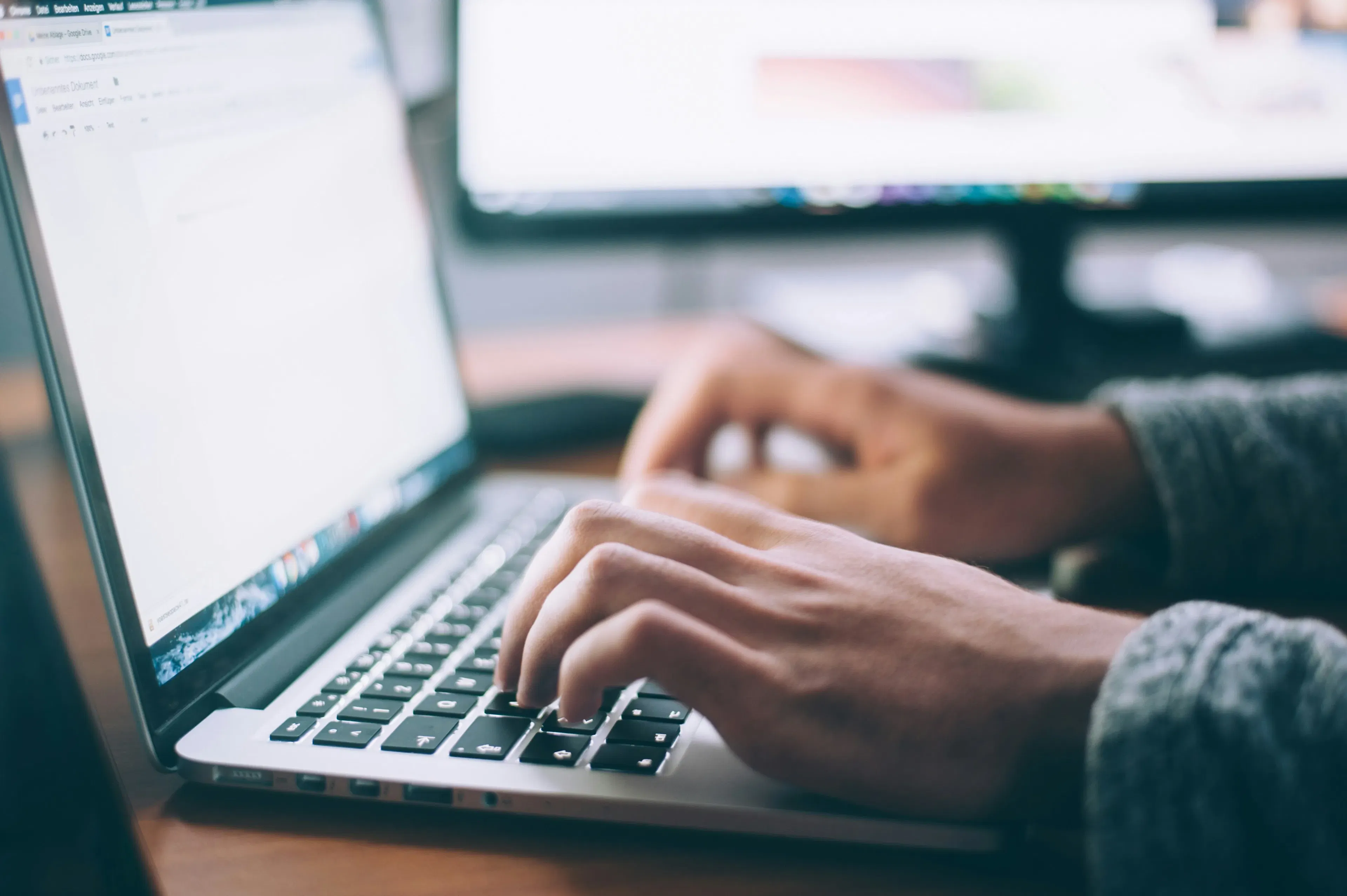 software development professional working on software project in modern office