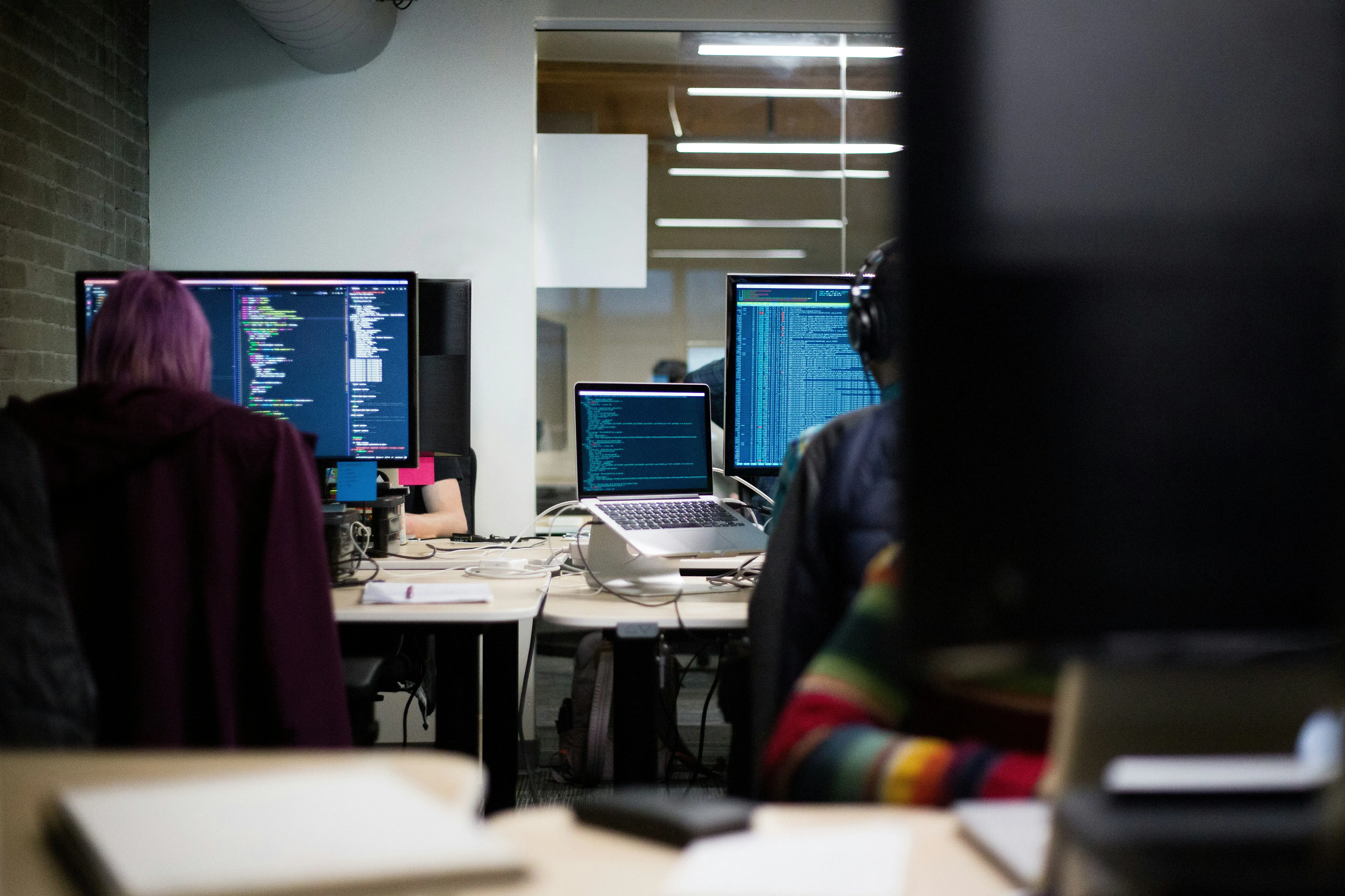 UX/UI design professional working on software project in modern office