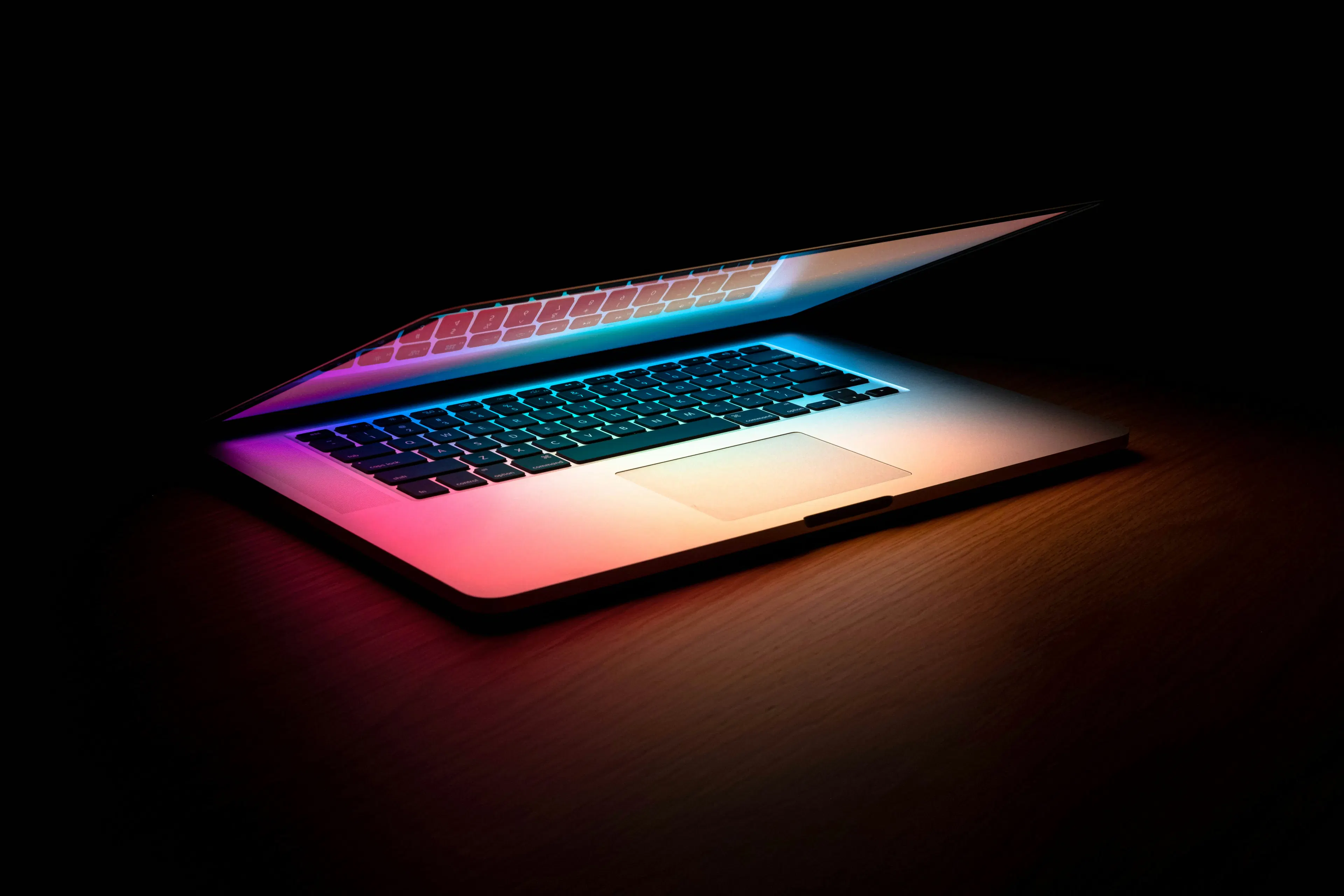 developer reviewing code on laptop screen