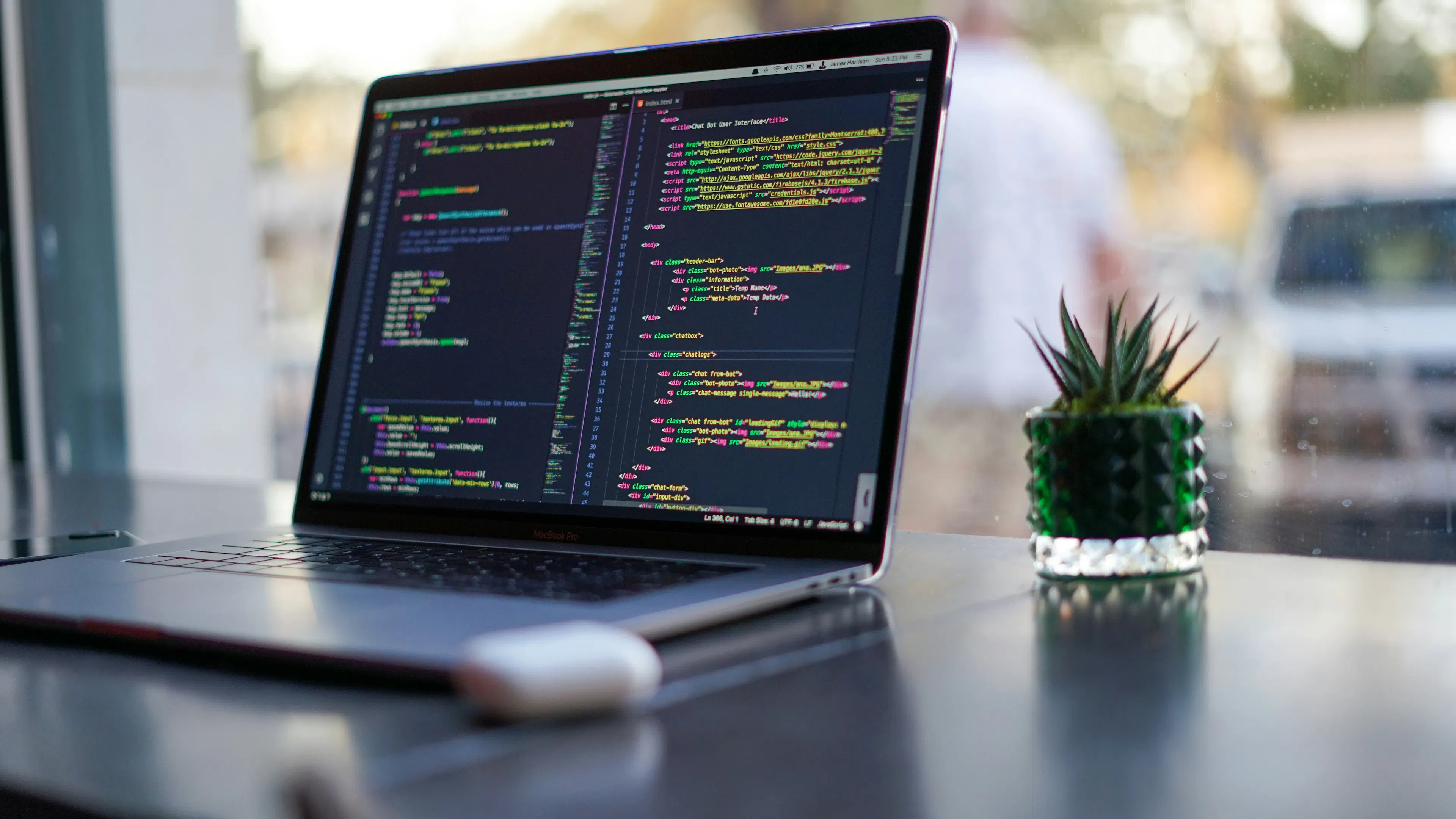 DevOps practices professional working on software project in modern office