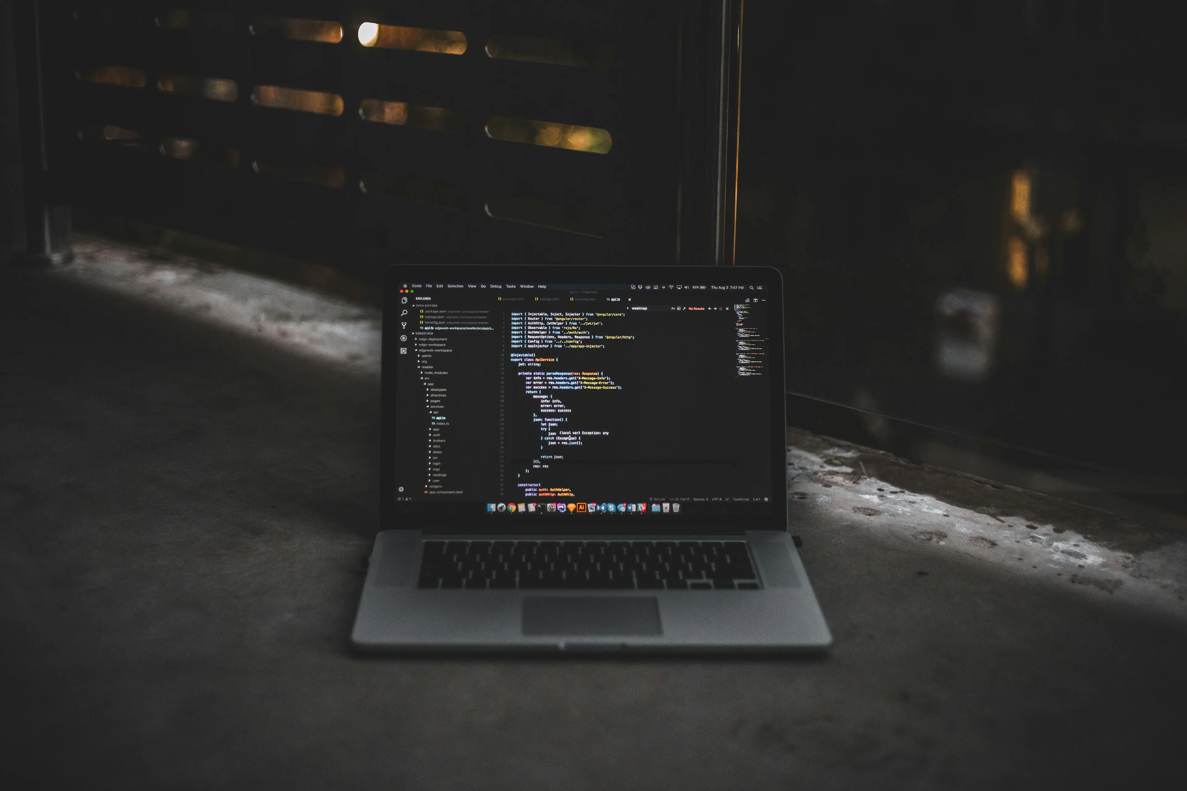 AI technology professional working on software project in modern office