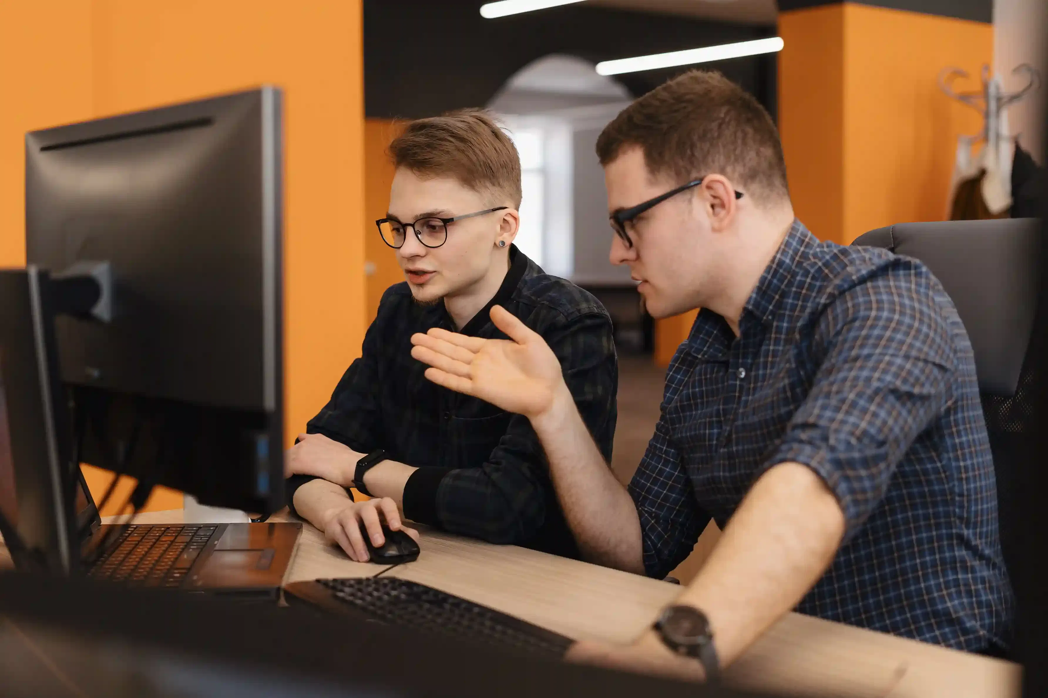 group of young entrepreneurs working in modern office