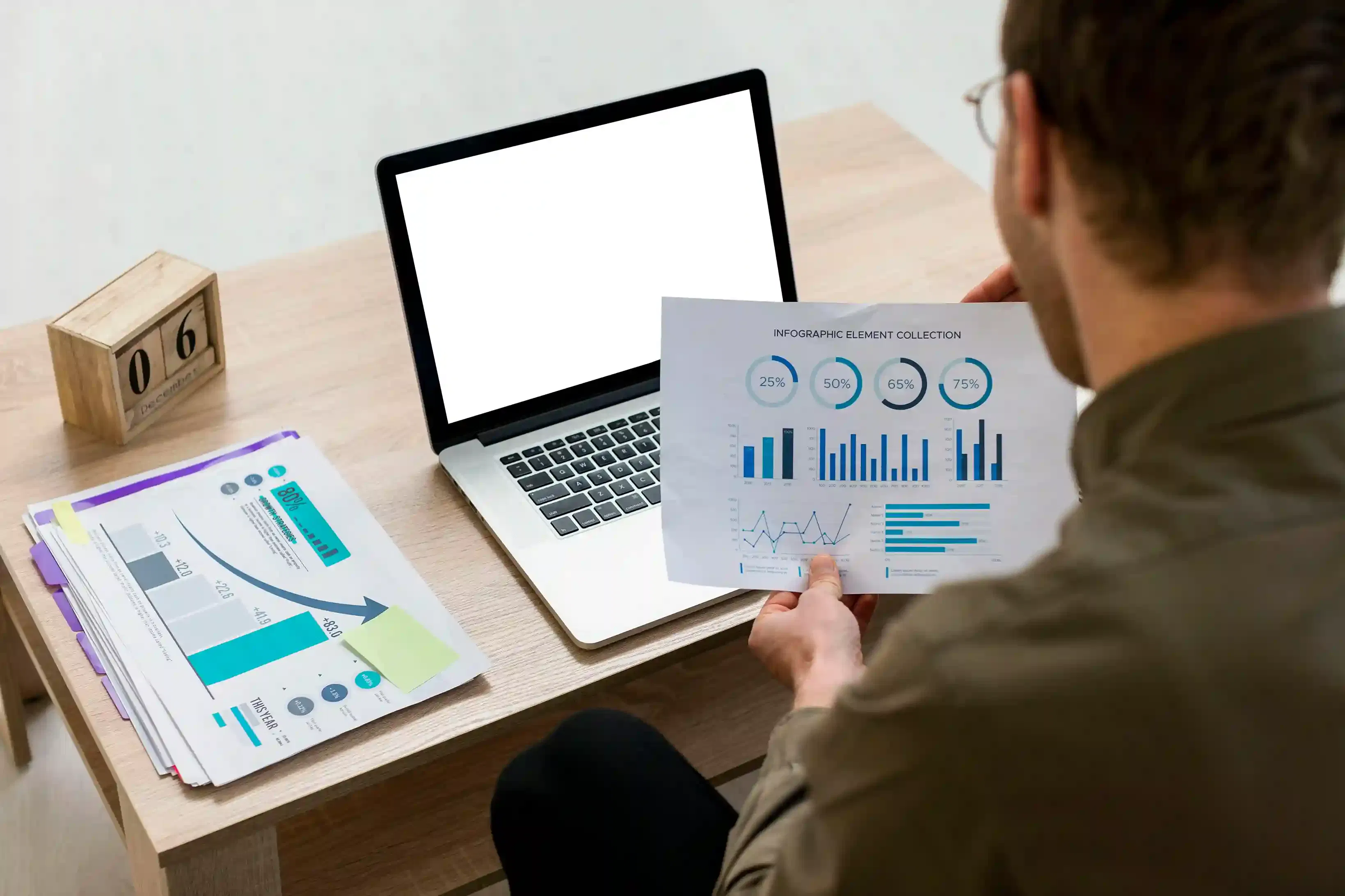 professional working with data infographics indoors