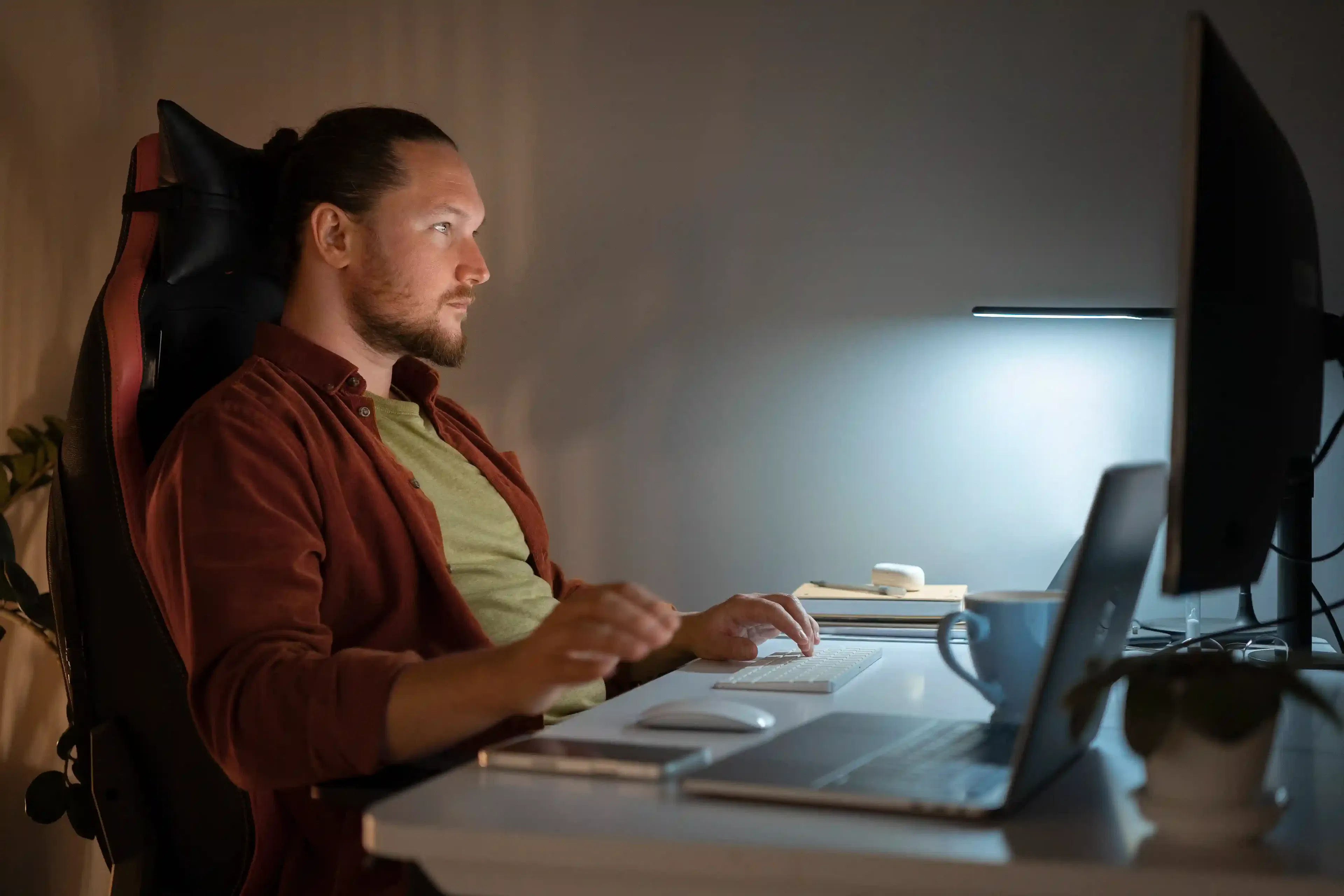 software engineer working late at night at desk