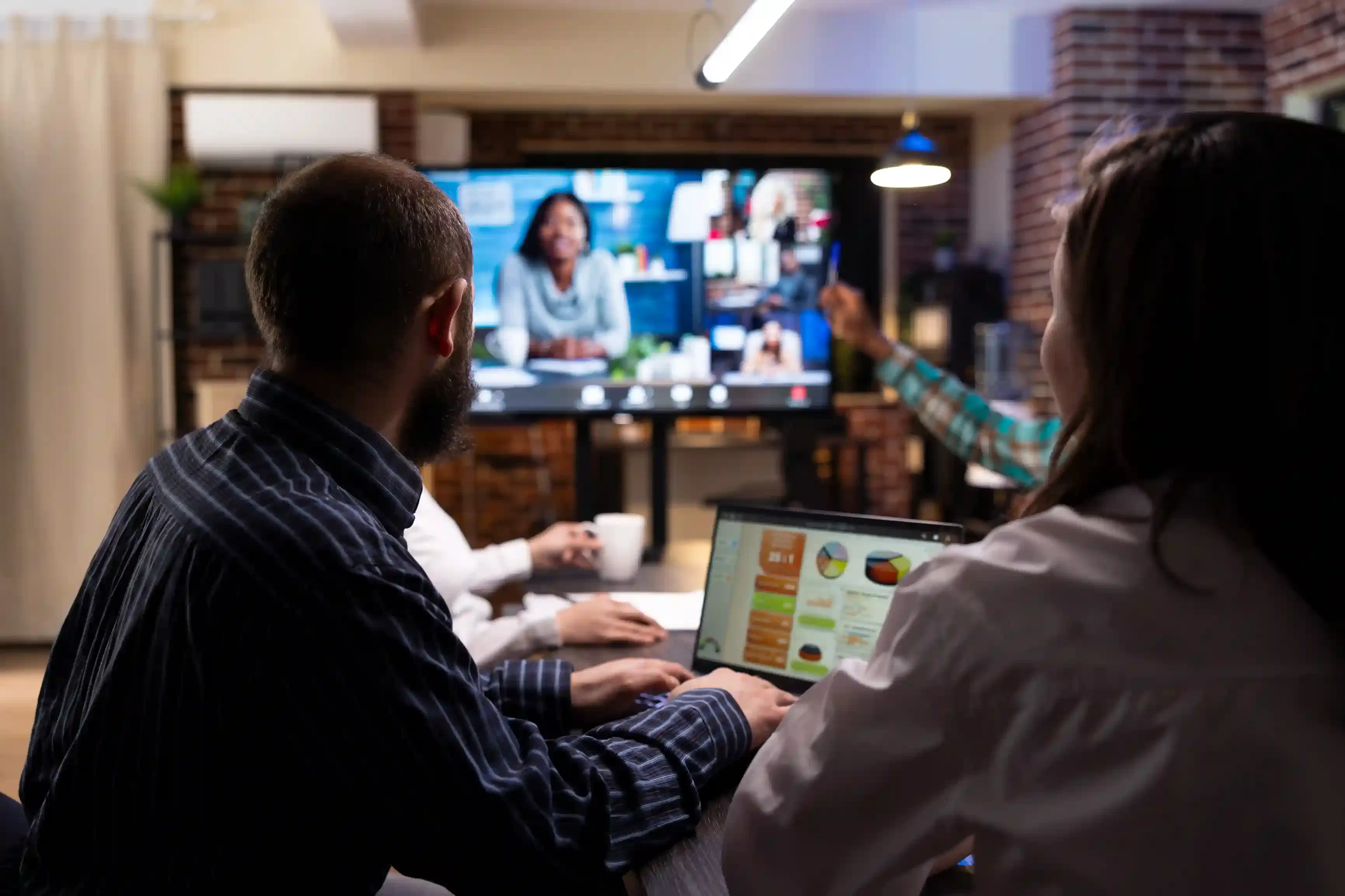diverse professionals in virtual team meeting