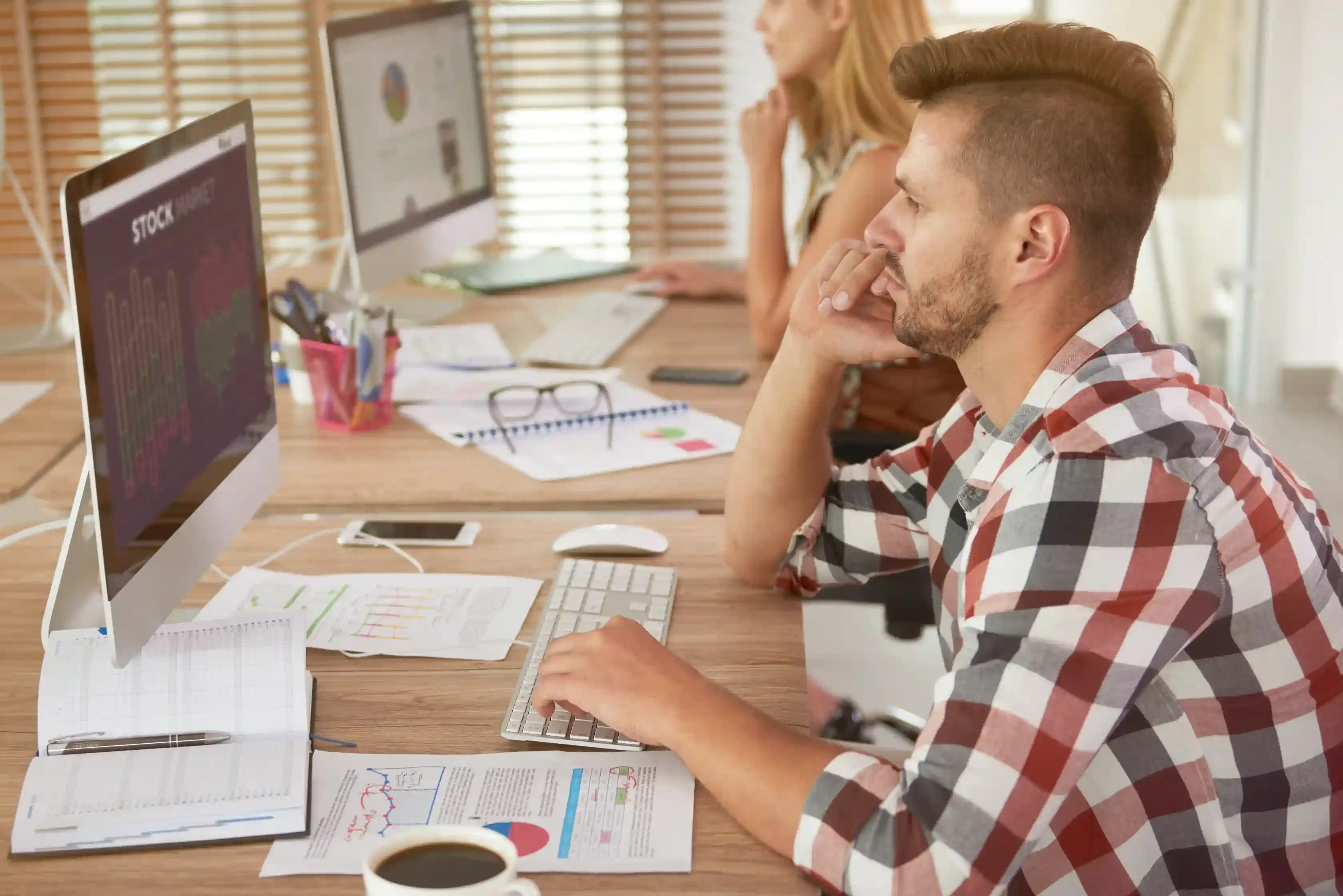 professionals collaborating in modern remote software development office