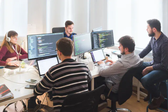 remote software development team working together in workspace