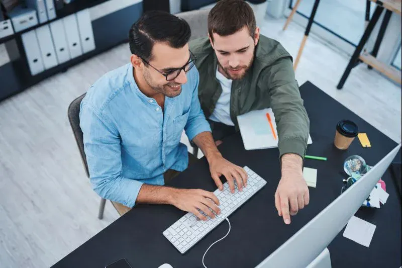 staff augmentation professional working on software project in modern office