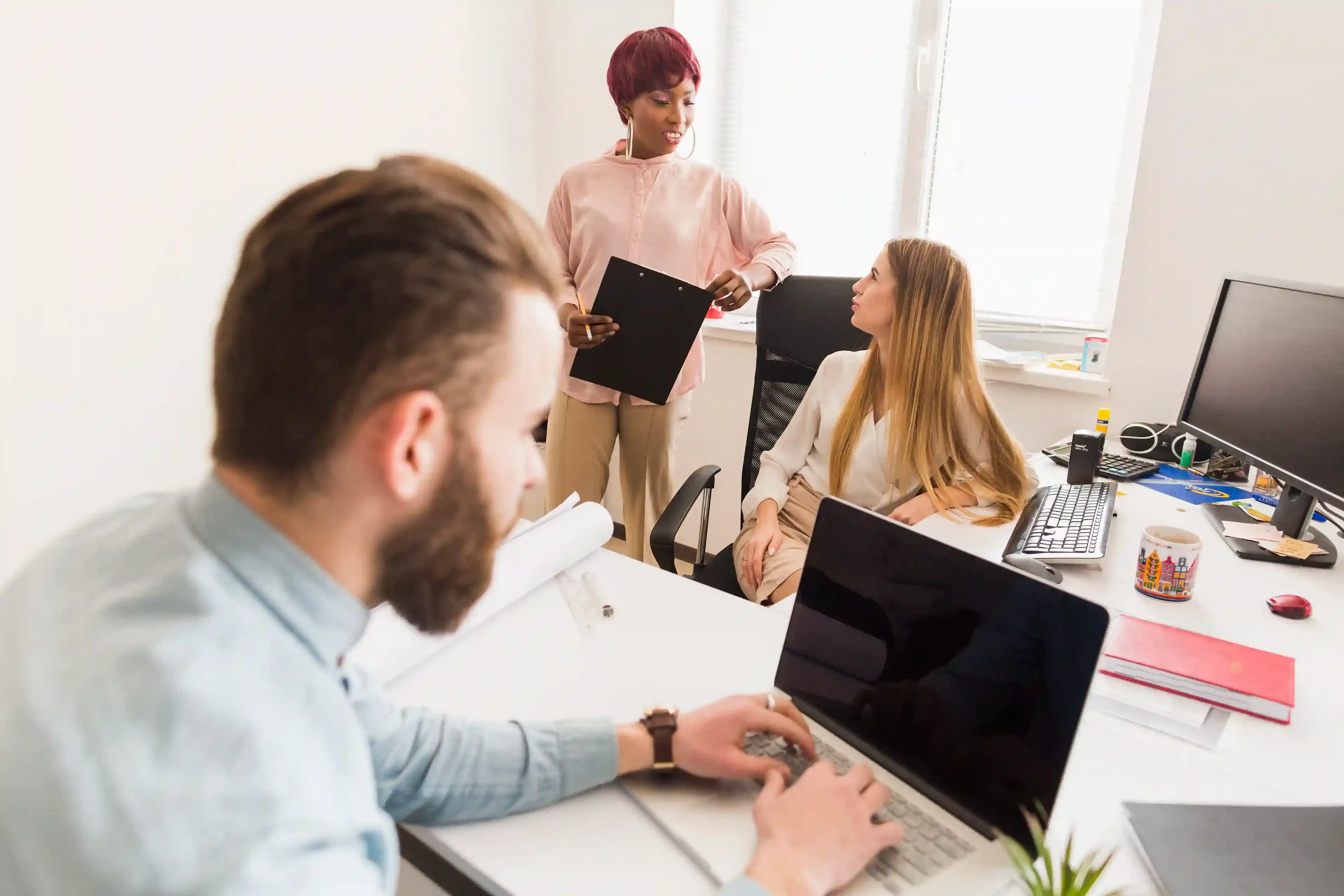 staff augmentation professional working on software project in modern office