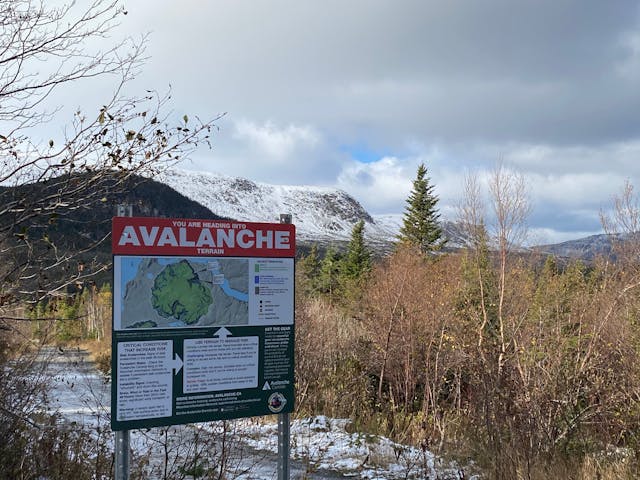 An avalanche terrain map in Newfoundland with a large mountain behind it.