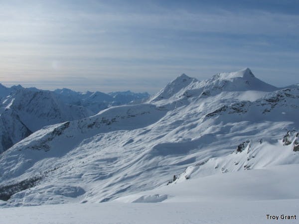 A shot of alpine terrain featuring convexities, cliffs, and other avalanche hazards.