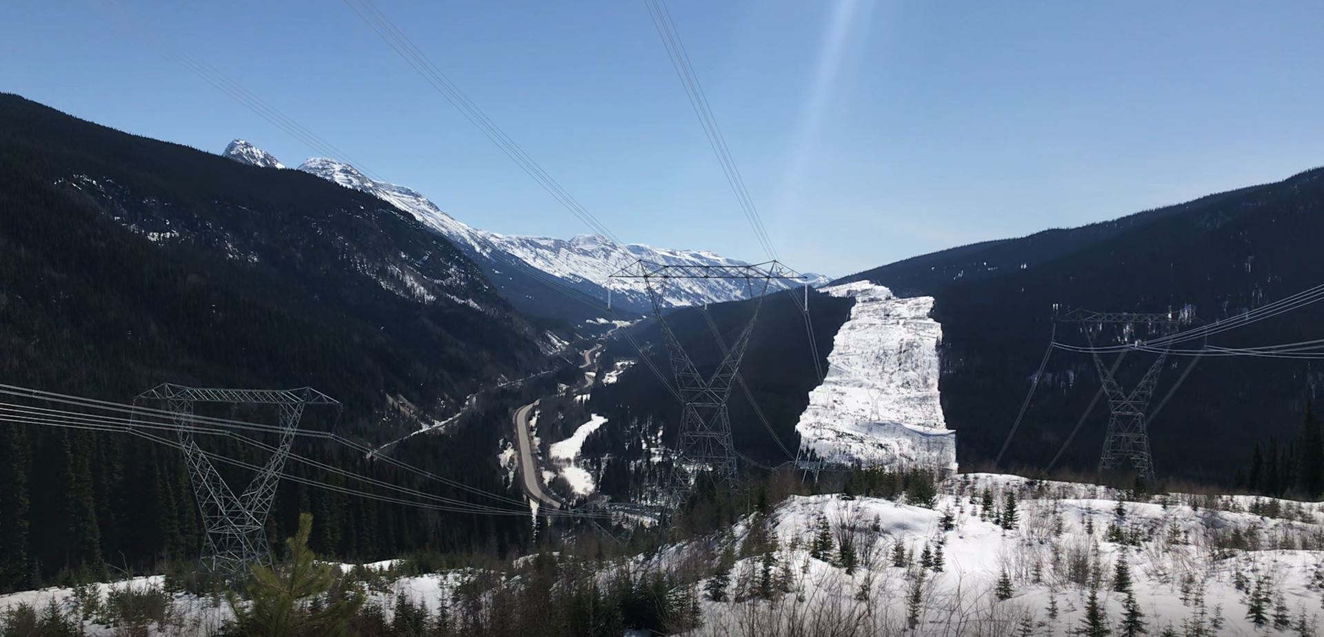 Powerlines with a clear space underneath.