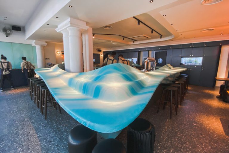 The beautiful blue and white bar at Analogue Singapore