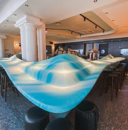 The beautiful blue and white bar at Analogue Singapore