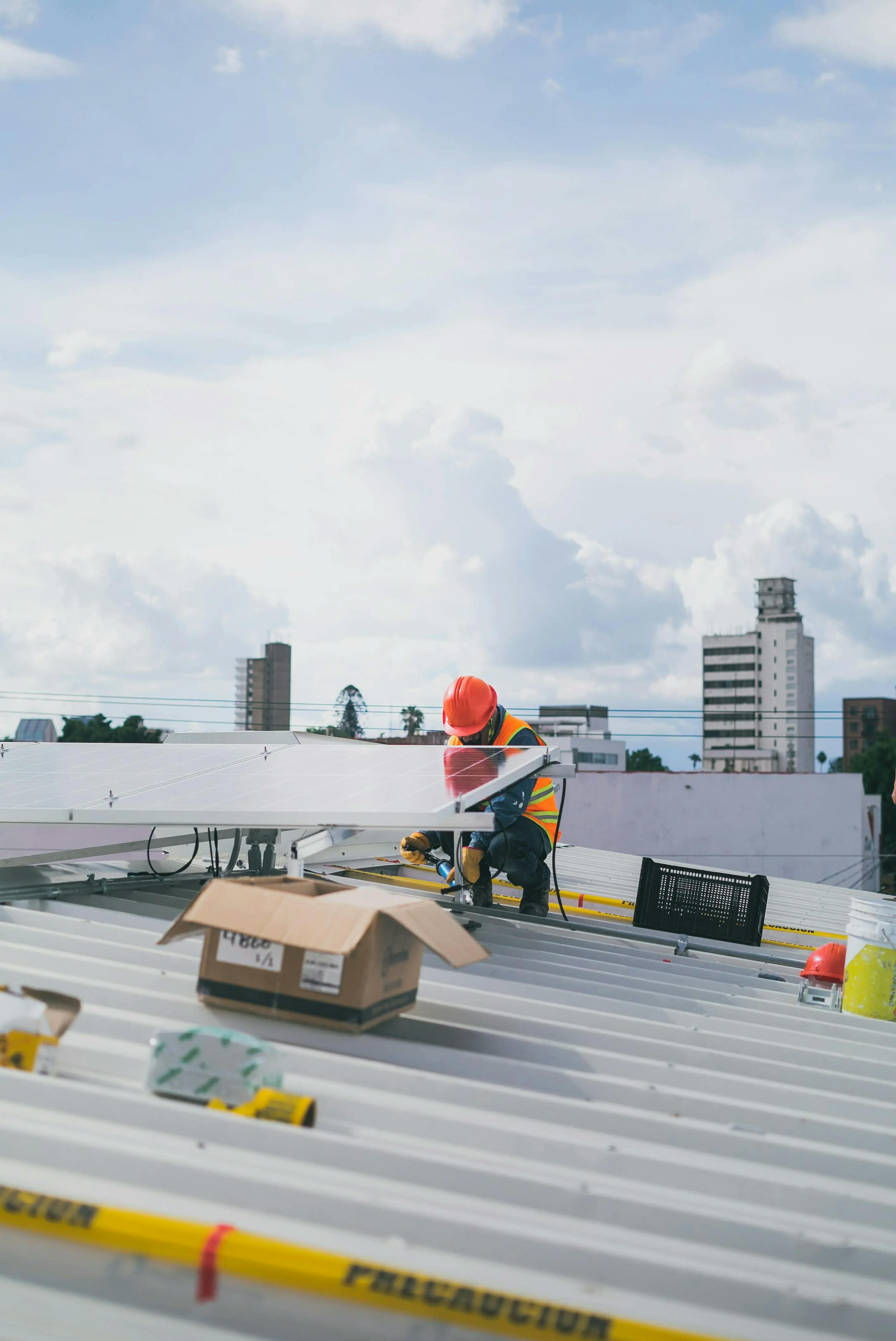 man installing solar panel