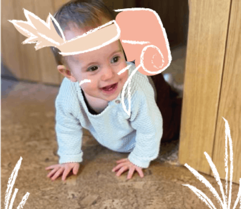 Little one crawling around laughing