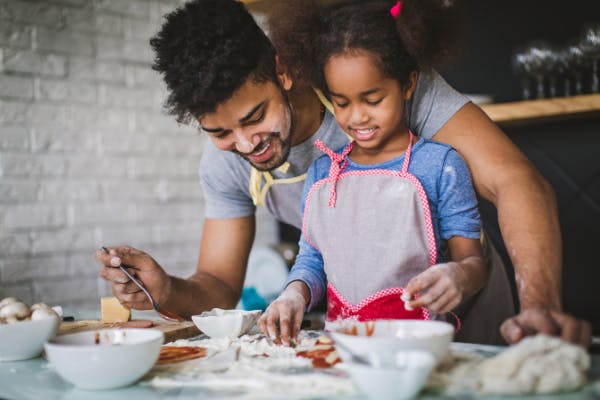 father-and-daughter-cooking-together