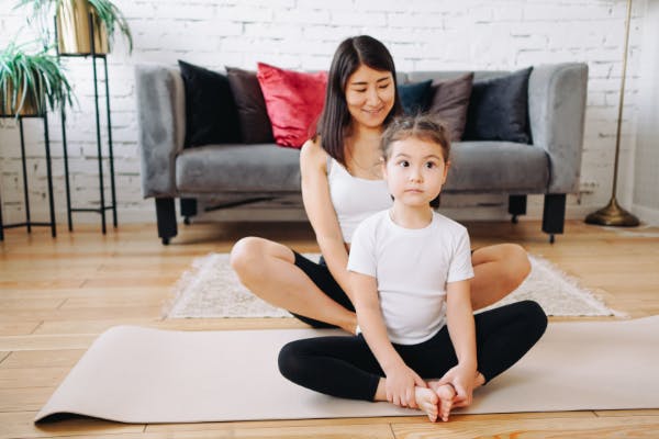 mom-and-daughter-doing-yoga