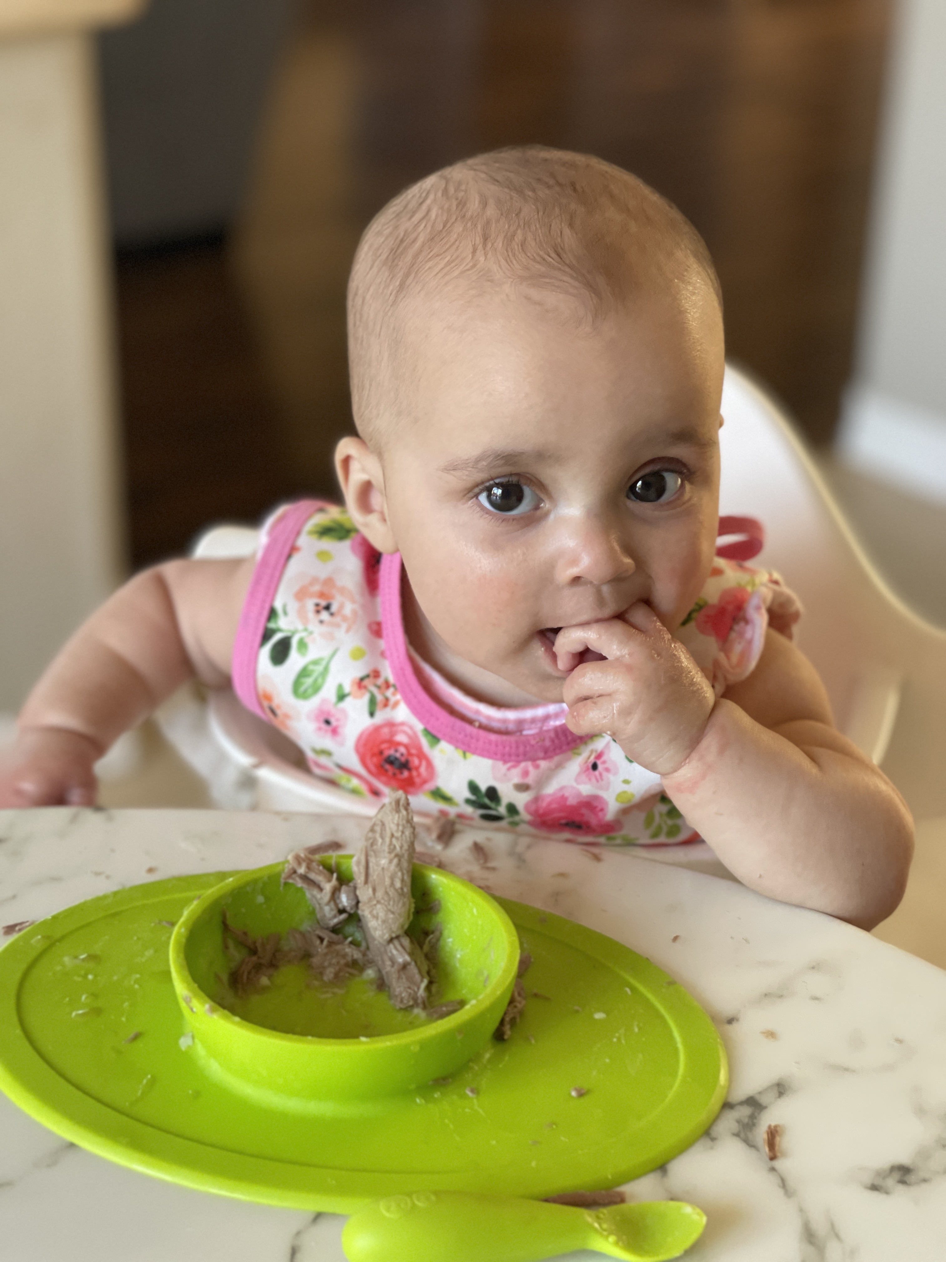 Baby eating shredded pork