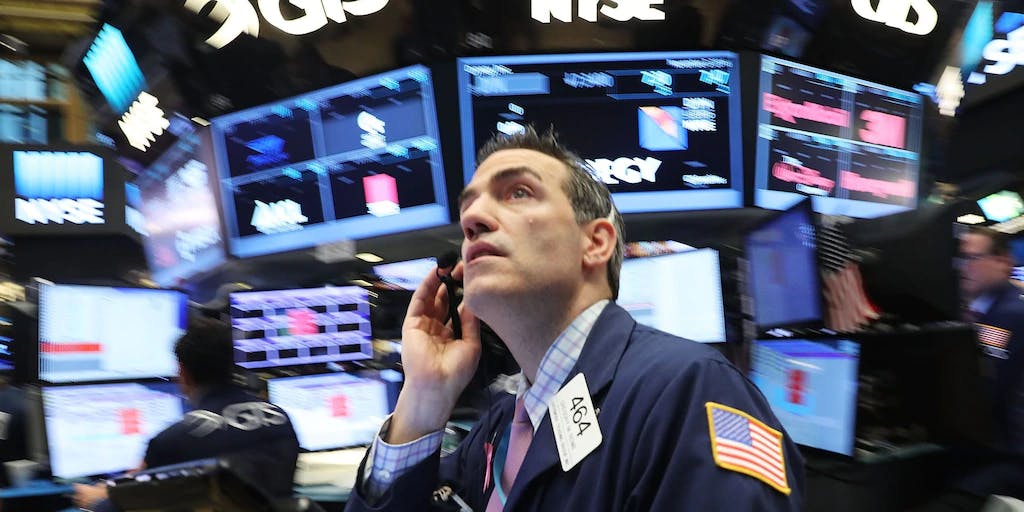 A trader at the New York Stock Exchange