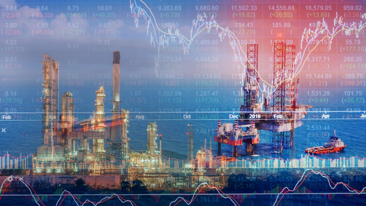 Image of offshore oil rigs spread with fiery stock charts superimposed on top.
