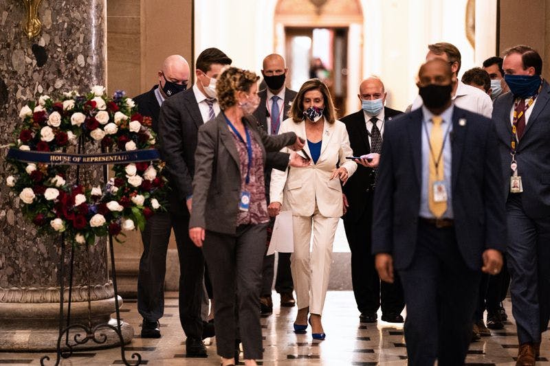 House Speaker Nancy Pelosi (D-Calif.), with reporters after speaking on the House floor at the Capitol in Washington, Thursday, Oct. 1, 2020.