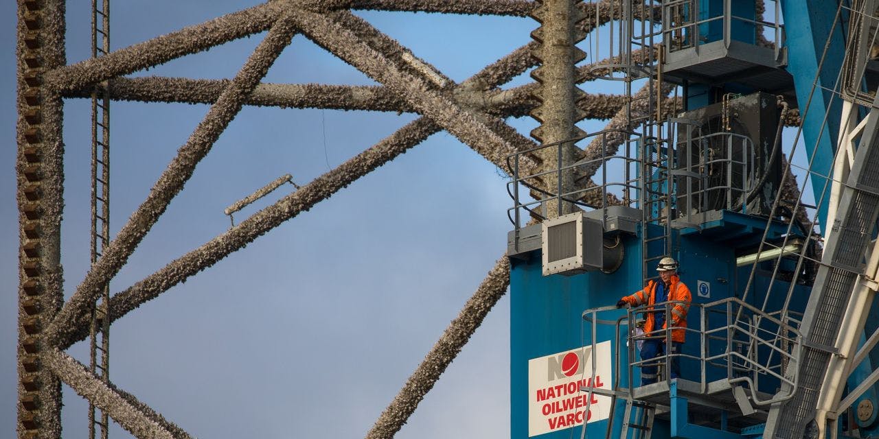 A worker stands on a National Oilwell Varco platform.