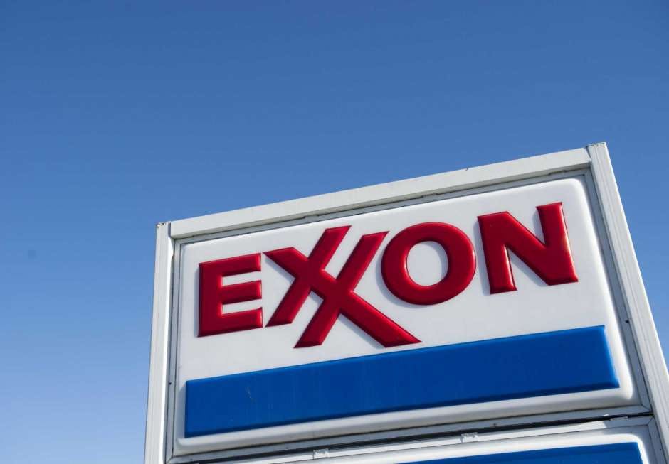 In this file photo taken on January 5, 2016, an Exxon gas station is seen in Woodbridge, Virginia.