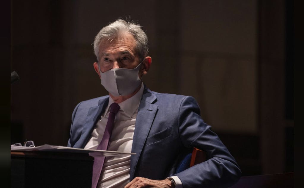 FILE PHOTO: Federal Reserve Chair Jerome Powell, wearing a face mask, testifies before the House of Representatives Financial Services Committee during a hearing on oversight of the Treasury Department and Federal Reserve response to the outbreak of the coronavirus disease (COVID-19), on Capitol Hill in Washington, U.S., June 30, 2020. 