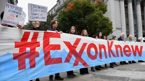 CLIMATE ACTIVISTS PROTEST EXXON OUTSIDE THE NEW YORK STATE SUPREME COURT ON OCTOBER 22, 2019. CHARGES THAT EXXONMOBIL MISLED INVESTORS ON THE FINANCIAL RISKS OF CLIMATE CHANGE WERE BEING HEARD IN COURT.