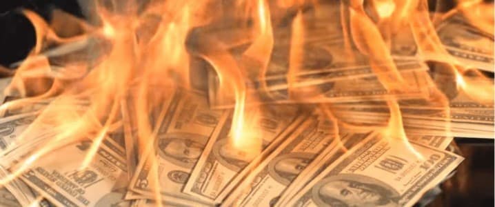 American currency on fire