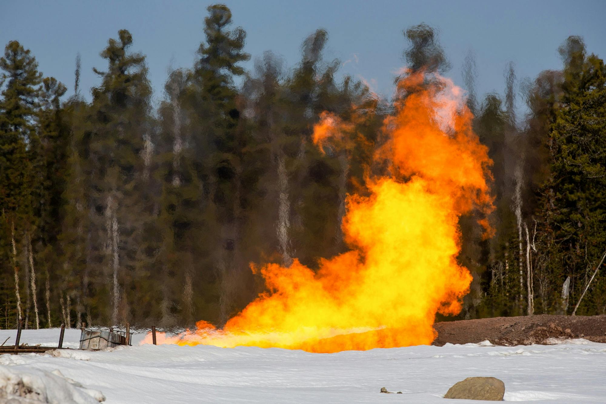 gas flare forest snow