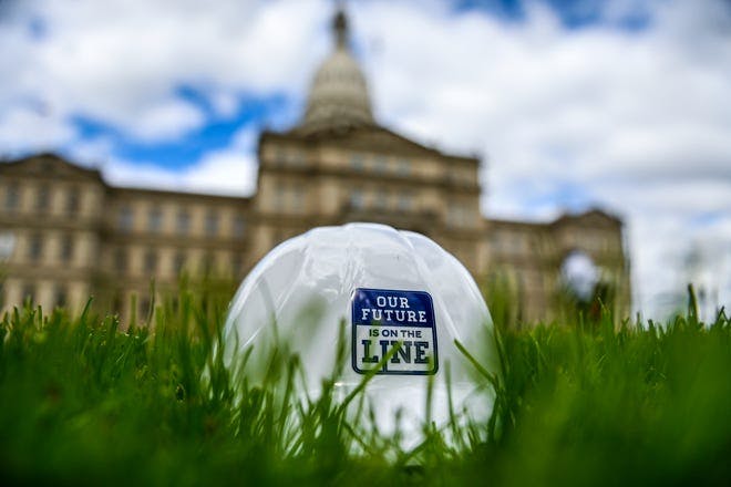 hard hat grass protest line 5 closure