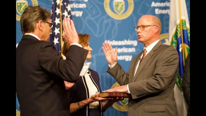 Bill Cooper being sworn in as general counsel of the Department of Energy