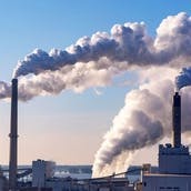 Oil refinery smoke stacks