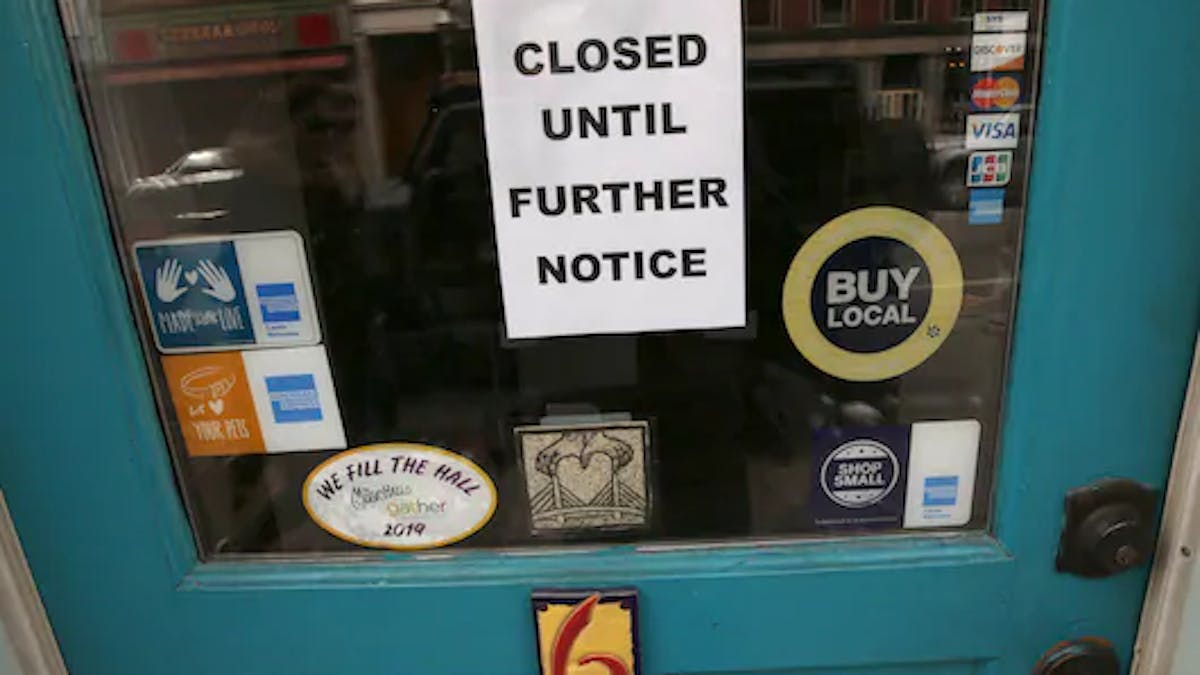 Closed Until Further Notice sign on a shop