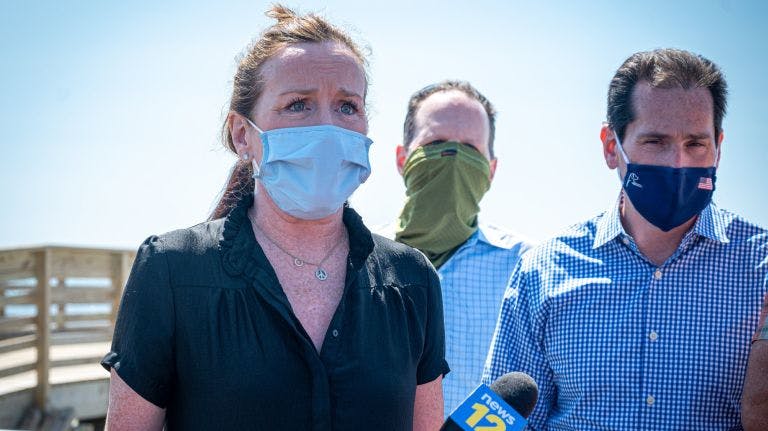 Rep. Kathleen Rice, left, and State Sen. Todd Kaminsky, right, in Long Beach Wednesday to talk about wind energy development.