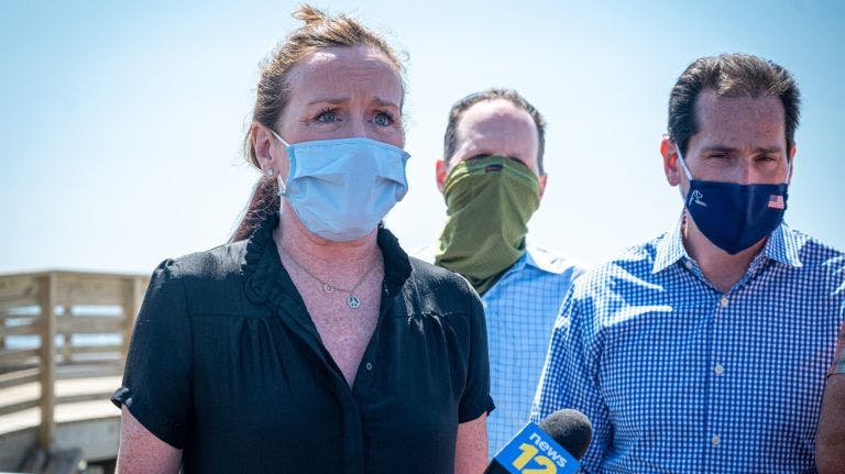 Rep. Kathleen Rice, left, and State Sen. Todd Kaminsky, right, in Long Beach Wednesday to talk about wind energy development. 