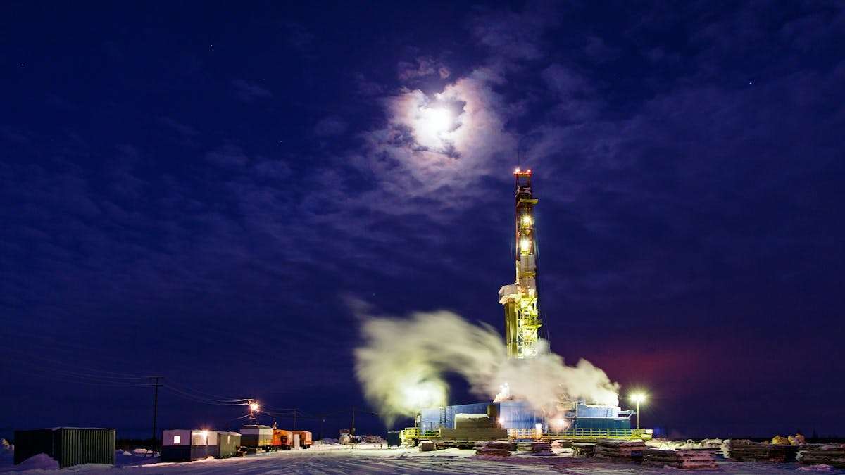 Oil derrick at night