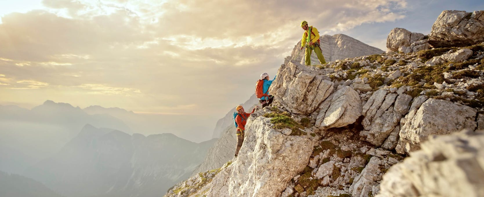 Climbers move forward avoiding risks to reach their goal, the summit