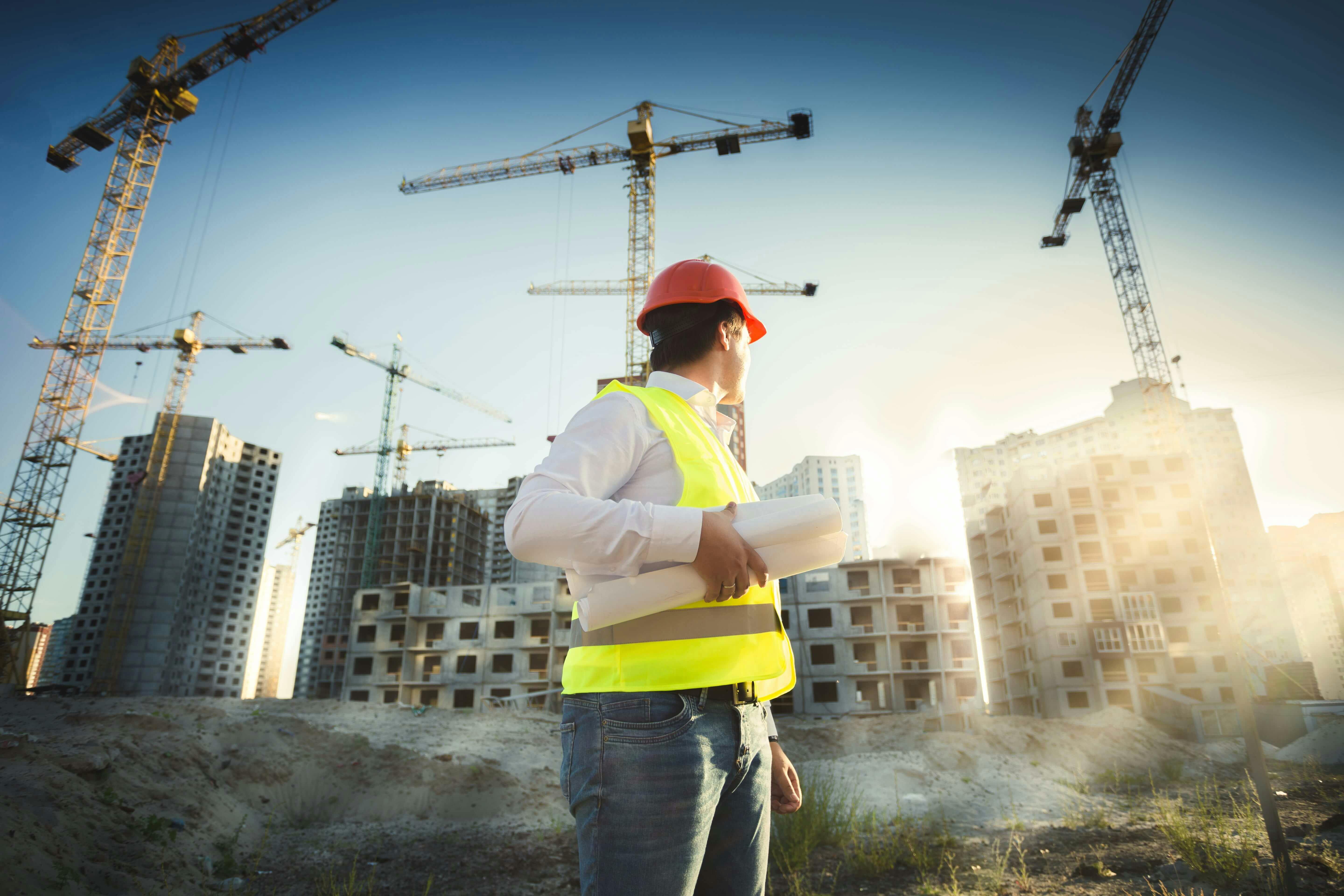 Construction industry professional overseeing a commercial construction project