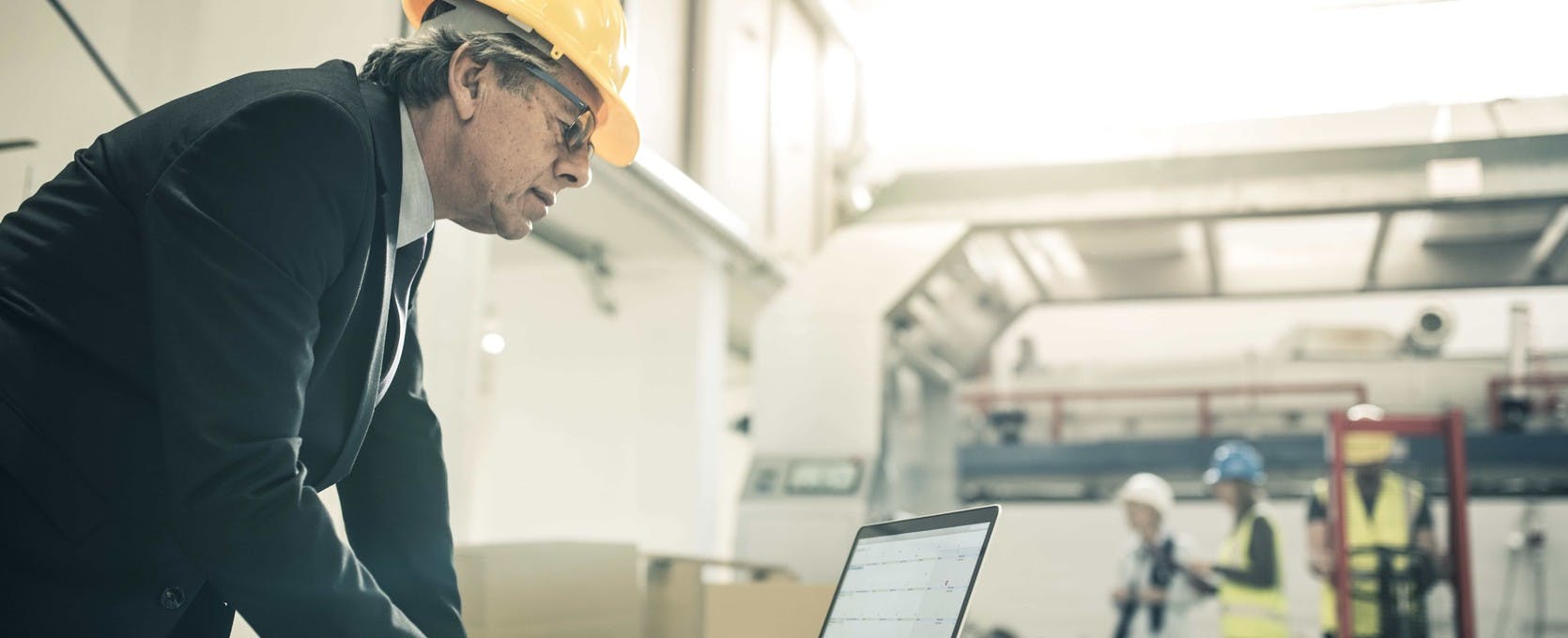 Construction worker with laptop