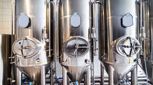 Three tanks for brewing beer