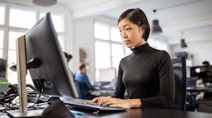Business professionals works at office computer