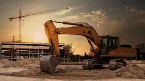 crane and bulldozer on construction site